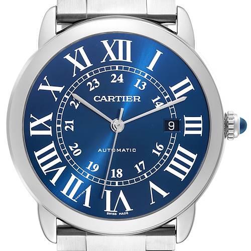 The image shows a front view of the Cartier Ronde watch, highlighting its blue dial, Roman numerals, and metal strap.