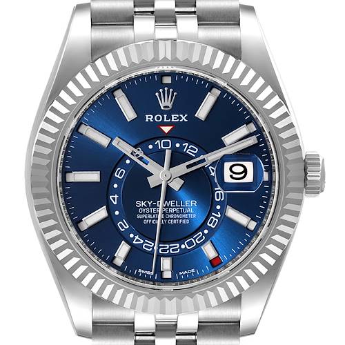 The image shows a front view of the Rolex Sky-Dweller watch, highlighting the dial, bezel, crown, and part of the bracelet.