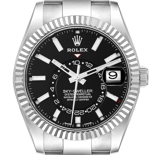 This image shows a frontal view of the Rolex Sky-Dweller, highlighting its black dial, fluted bezel, and date window.