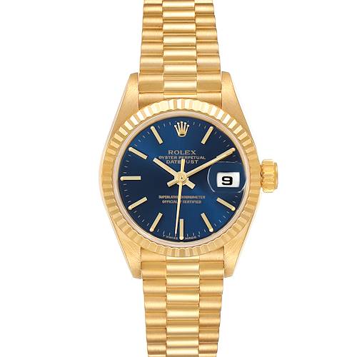 The image shows a front view of the Rolex President model watch, highlighting its gold band, blue dial, and date window.