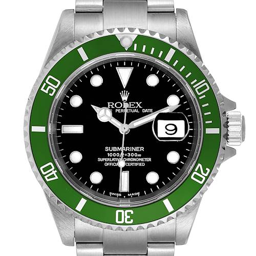 The image shows a front view of the Rolex Submariner watch, highlighting the green bezel, black dial, and metal bracelet.
