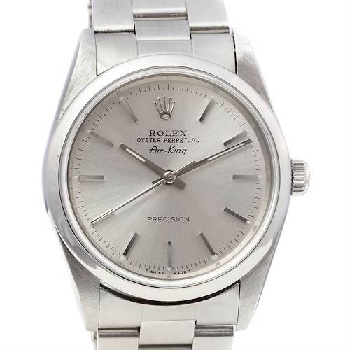 The image shows a frontal view of a Rolex Air-King watch, highlighting its dial, bezel, crown, and bracelet.