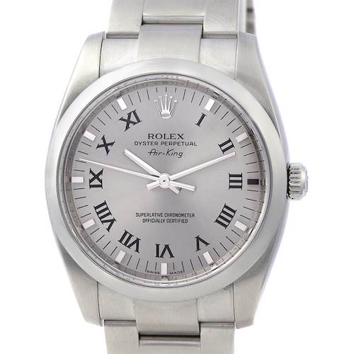 The image shows a front view of a Rolex Air-King watch, highlighting the dial, crown, and part of the bracelet.
