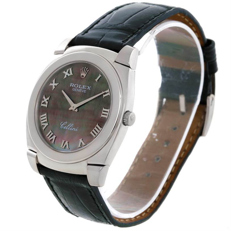 The Rolex Cellini watch is shown at an angled side view, highlighting the face, bezel, and leather strap.
