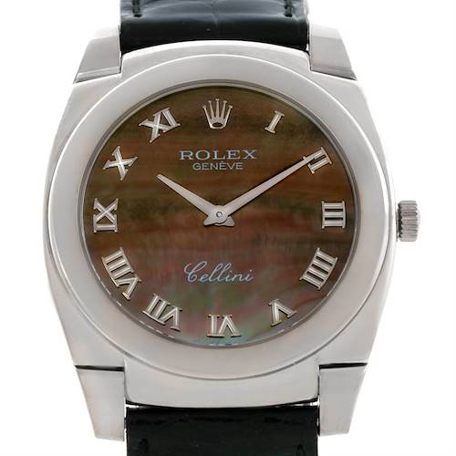 The Rolex Cellini watch is shown from a front angle, highlighting the dial, hands, Roman numeral markers, and part of the leather strap.