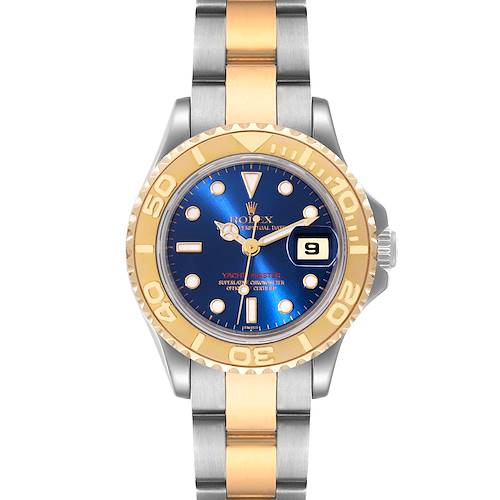 The image shows a front view of a Rolex Yacht-Master watch highlighting its blue dial, gold bezel, and two-tone bracelet.