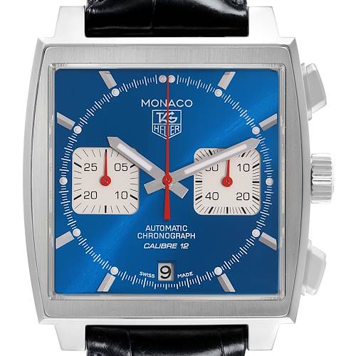 The image shows a front view of the Tag Heuer Monaco watch, highlighting the blue dial, chronograph subdials, and date window.