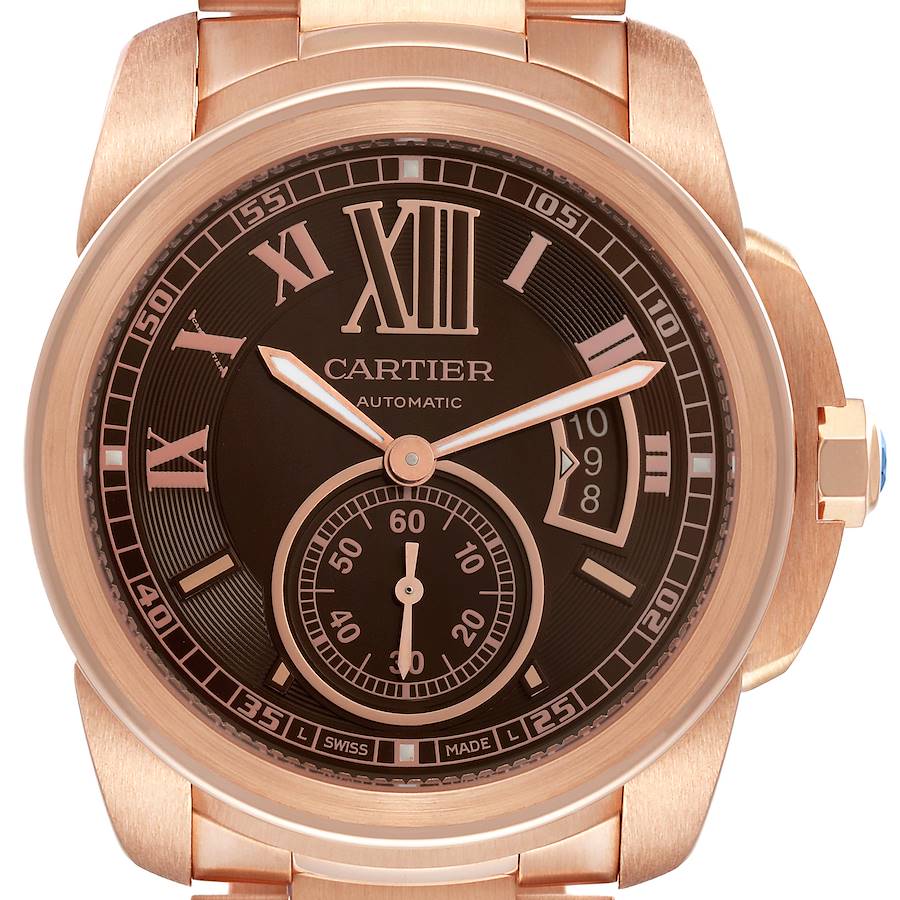 The image shows a close-up of the Calibre de Cartier watch face, highlighting the dial, hands, and bezel.