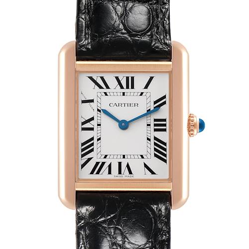 The Cartier Tank Solo watch is shown from the front, featuring its dial, Roman numerals, case, and part of the leather strap.