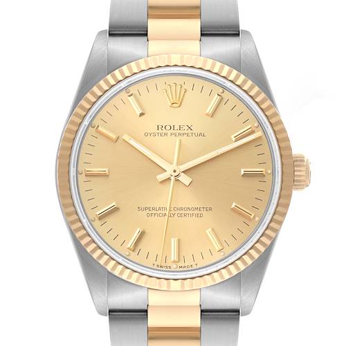 The image shows a close-up of the Rolex Oyster Perpetual watch's face, bezel, and part of the bracelet.