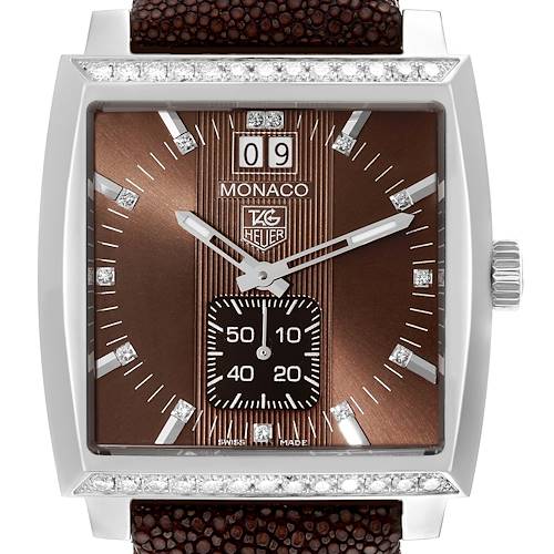 Close-up view of the Tag Heuer Monaco watch showing the face, dial, crown, and part of the strap.