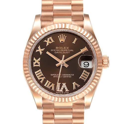 This image shows a front view of a Rolex President model watch, highlighting the dial, hands, bezel, and bracelet.