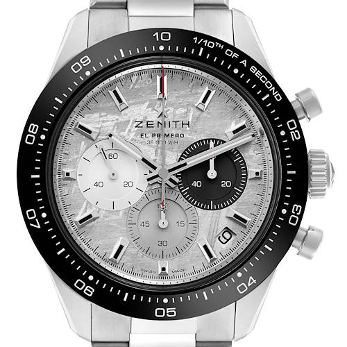 The Zenith Chronomaster watch is shown from the front, highlighting its dial, bezel, and side buttons.
