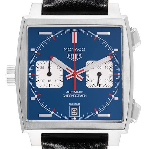 The Tag Heuer Monaco watch is shown from the front, displaying its square dial with subdials, date, and crown.