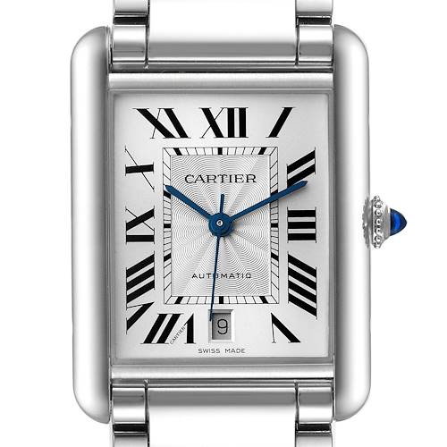 The image shows a close-up of the Cartier Tank Must watch, featuring the face, bezel, and part of the bracelet.