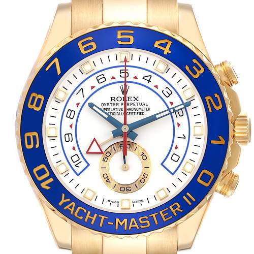 The Rolex Yacht-Master watch is shown from a top-down angle, highlighting the dial, bezel, hands, and part of the bracelet.