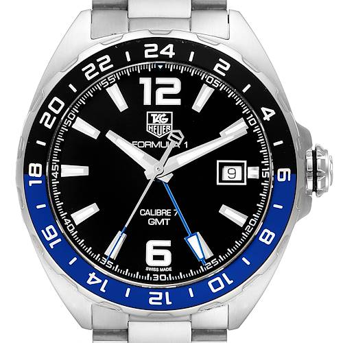 The image shows a front view of the Tag Heuer Formula 1 Calibre 7 GMT watch, displaying the dial, hands, date window, and part of the bracelet.