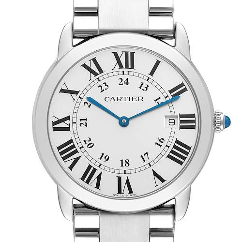 The Cartier Ronde model is shown from a front angle, displaying the dial, Roman numerals, blue hands, and part of the bracelet.