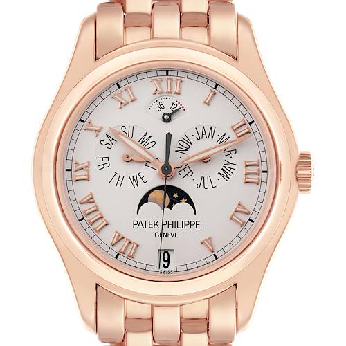 The Patek Philippe Complications watch is shown from a front angle, displaying the dial, hands, and bracelet.