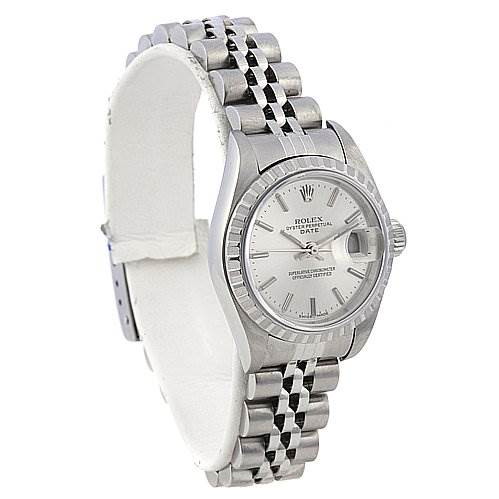 The image shows a Rolex Date model watch at an angled side view, highlighting its bracelet, bezel, and face.