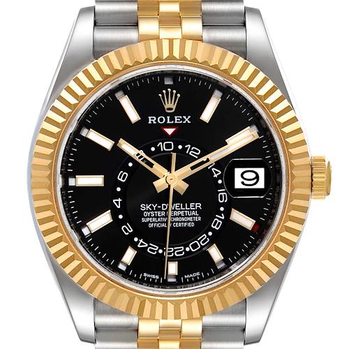 The image shows a front view of a Rolex Sky-Dweller watch displaying the dial, hands, bezel, and part of the bracelet.