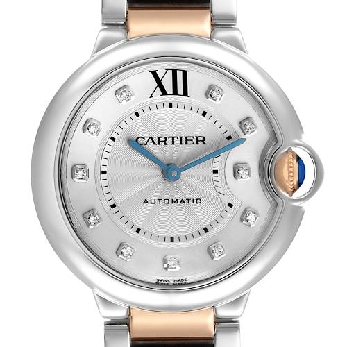 The Cartier Ballon Bleu watch is shown from the front, highlighting its dial, blue hands, Roman numeral, and signature crown.