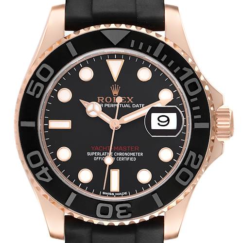 The Rolex Yacht-Master watch is shown from the front, displaying the dial, bezel, and part of the bracelet.