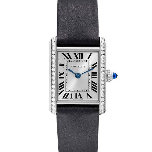 The Tank Must watch by Cartier is shown from the front, displaying its face, bezel, and strap.
