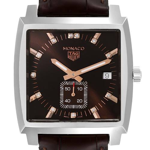 The image shows a close-up angled view of a Tag Heuer Monaco watch face, displaying the dial, hands, date window, and part of the strap.