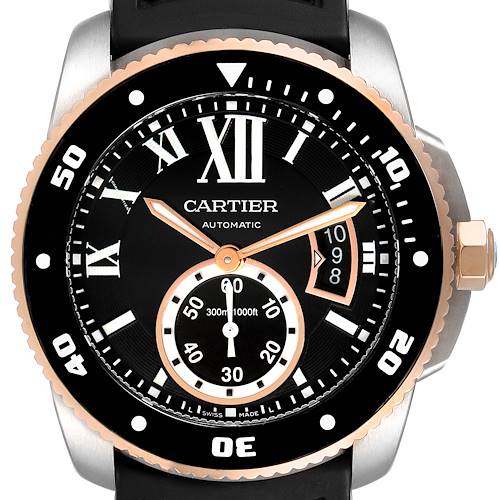 The image shows a front close-up view of the Calibre de Cartier watch by Cartier, highlighting its dial, bezel, and crown.