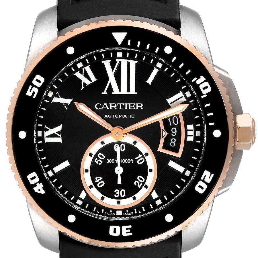 The image shows a frontal view of the Calibre de Cartier watch by Cartier, displaying the dial, bezel, and crown.