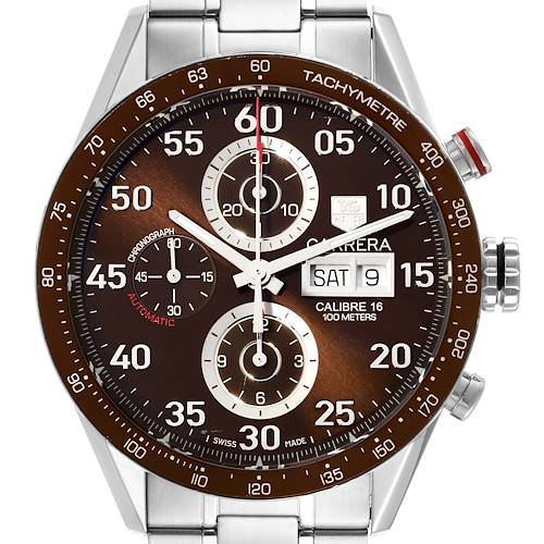 The image shows a frontal view of a Tag Heuer Carrera watch with a brown dial, tachymeter bezel, and stainless steel bracelet.