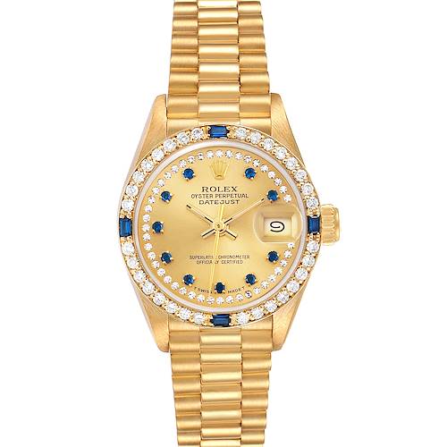 The Rolex President model watch is shown from a top view, highlighting the face, bezel, and bracelet.