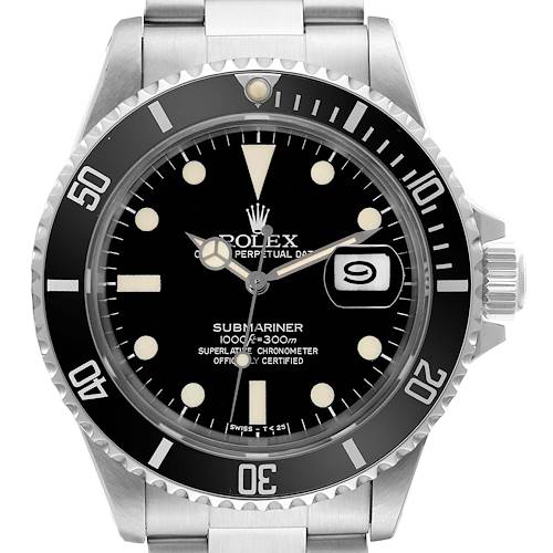 The image shows a front view of the Rolex Vintage Collection Submariner watch, highlighting its black dial, date window, and bezel.