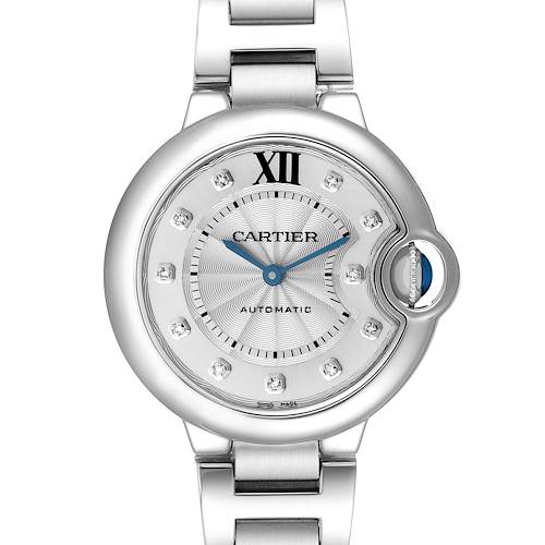 The Cartier Ballon Bleu watch is shown from a front angle, displaying its face, crown, and part of the metal bracelet.