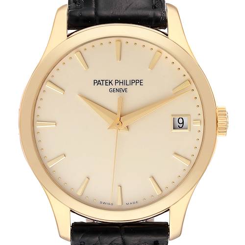 This image shows a front view of the Patek Philippe Calatrava watch, highlighting its dial, hands, date window, and leather strap.