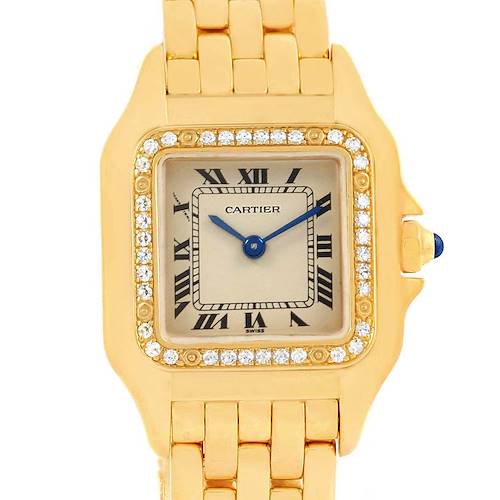 The image shows a close-up of the dial and part of the bracelet of a Cartier Panthere watch.