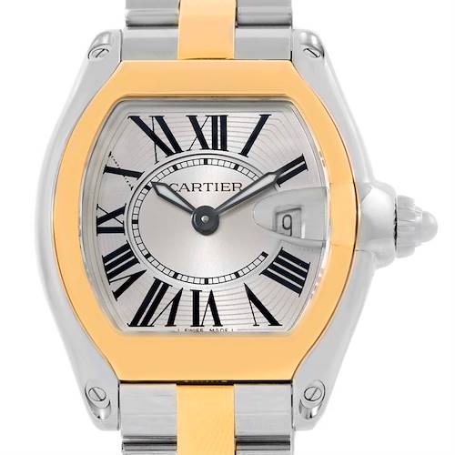 This image shows a close-up of the dial and bezel of the Cartier Roadster watch, highlighting the Roman numerals and date window.