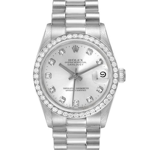 The image shows a frontal view of a Rolex President model watch, highlighting the dial, bezel, and bracelet.