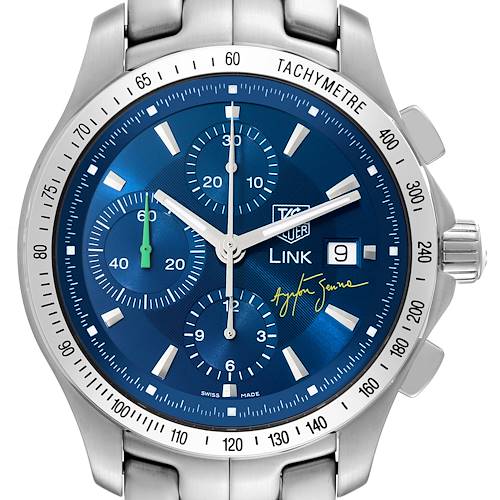 The image shows a close-up of the Tag Heuer Link Limited Edition watch face, highlighting the chronograph dials, tachymeter, and date display.