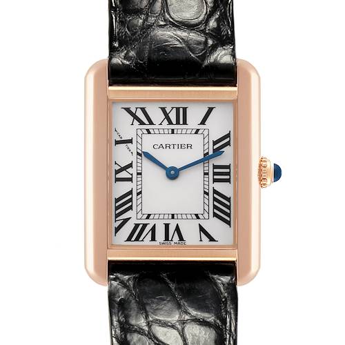The Cartier Tank Solo watch is shown from a front angle, highlighting the dial, Roman numerals, and leather strap.