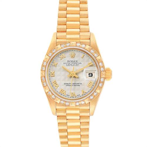 This is a Rolex President model watch with a gold bracelet, diamond-studded bezel, and date display.