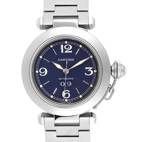 The image shows a front view of a Cartier Pasha watch with a blue dial and silver bracelet.