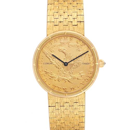The image shows a front view of the Corum Coin 10 Dollars Eagle Yellow Gold Ladies Watch 1901 model, highlighting the dial, hands, and band.