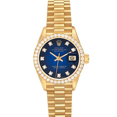 The Rolex President model watch is shown from the front, highlighting its blue dial, gold bracelet, and diamond bezel.