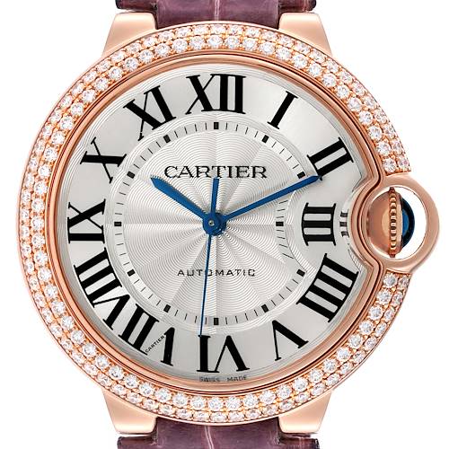 The image shows a Cartier Ballon Bleu watch face, focusing on the dial, diamond-set bezel, and part of the strap.