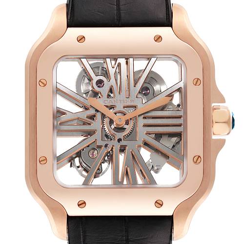 Close-up of a Cartier Santos watch showing the skeleton dial, rose gold case, and black leather strap.