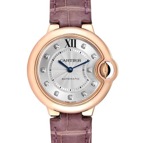 This image shows a frontal view of a Ballon Bleu by Cartier watch with a rose gold bezel, silver dial, and leather strap.