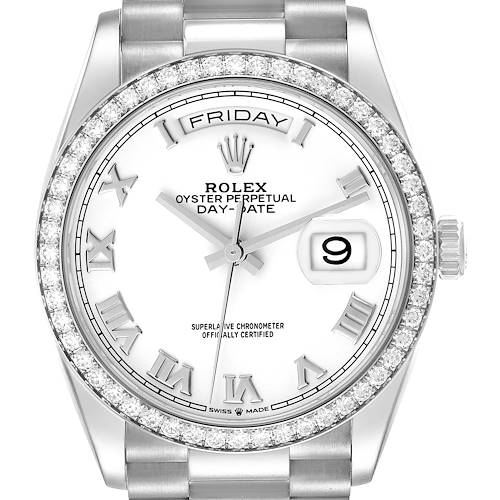 The image shows a Rolex President model watch from a front angle, highlighting its diamond bezel, day-date display, and Roman numerals.