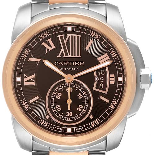 This image shows a frontal view of the watch face and case of the Calibre de Cartier model by Cartier.